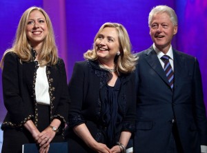 Chelsea, Hillary and Bill Clinton bask in the limelight.